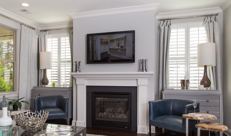 Raleigh fireplace with white shutters.